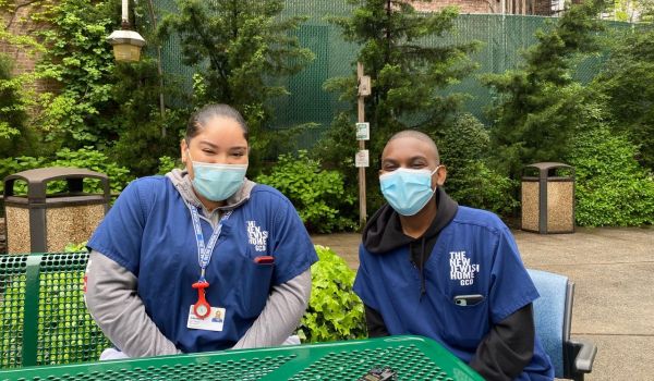 2 teens in their nursing attire